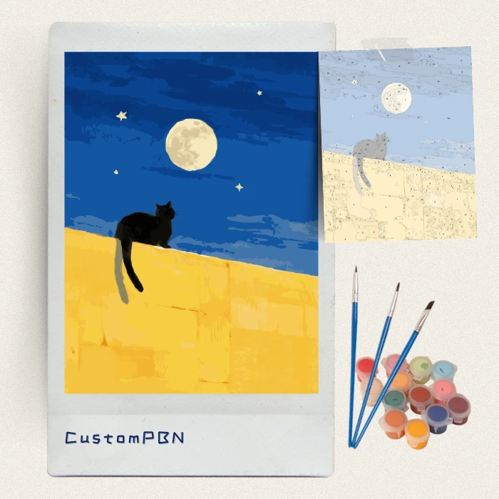 Complete DIY painting kit including numbered canvas, acrylic paint pots, brushes, and reference guide for black cat moon design.