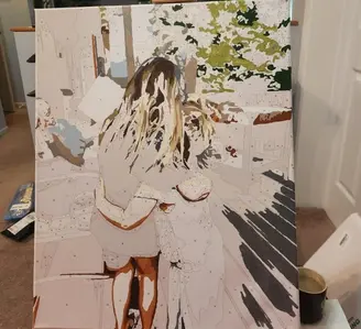 A custom figure paint by numbers canvas in progress showing the back of a woman with long hair, highlighting the detailed numbered sections and initial paint layers.