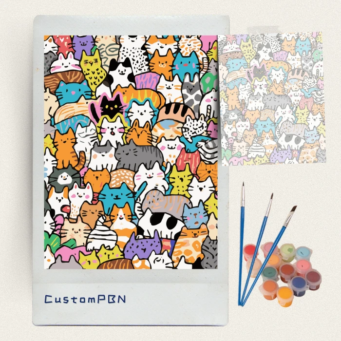 DIY art kit contents showing numbered pattern of doodle cats, acrylic paints, and brushes for custom painting.