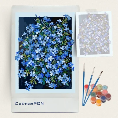 Complete relaxing floral painting kit displaying a blue blossom template, 24 vibrant acrylic colors, and three paintbrushes