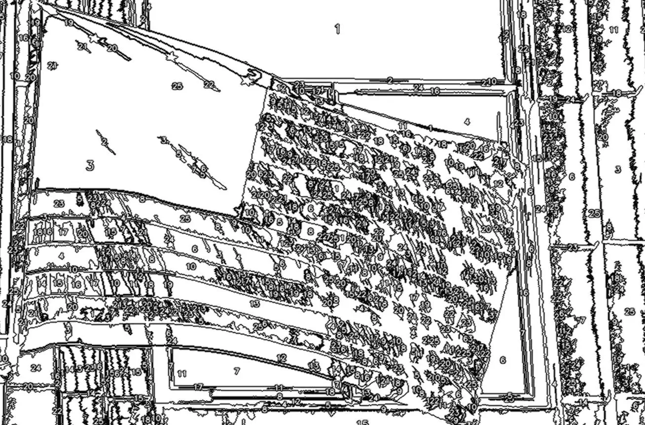 Close-up of a low-quality paint by numbers template showing jagged lines, messy numbers, and unpaintable tiny facets on an American flag design.