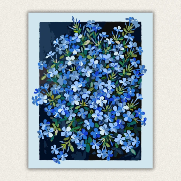 Finished DIY botanical wall art featuring a lush cluster of vibrant blue flowers on a contrasting dark background