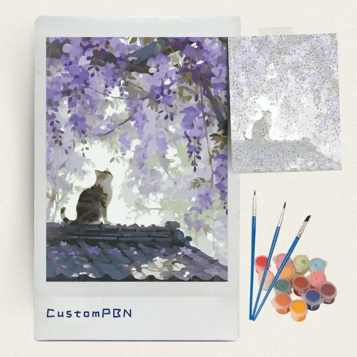 Box contents of a custom cat paint by number kit, including canvas, paints, and brushes