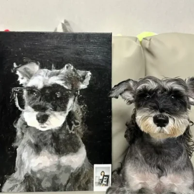 Custom dog paint by number canvas next to a real black and white Schnauzer wearing glasses and a reference polaroid photo.