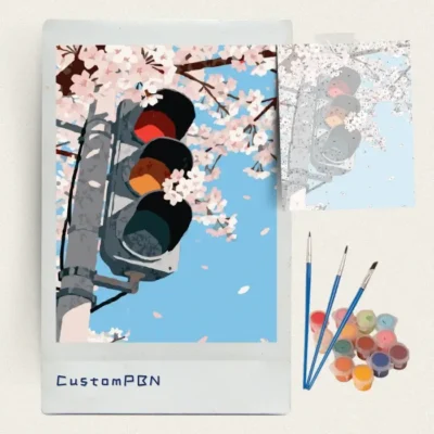 Box contents of the cherry blossom DIY paint by number kits including canvas, 24 paints, and brushes