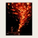 Finished paint by numbers canvas of a fisherman with glowing lanterns and flying fire fish