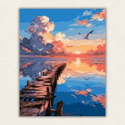 Finished paint by numbers canvas of a colorful sunset over a wooden pier