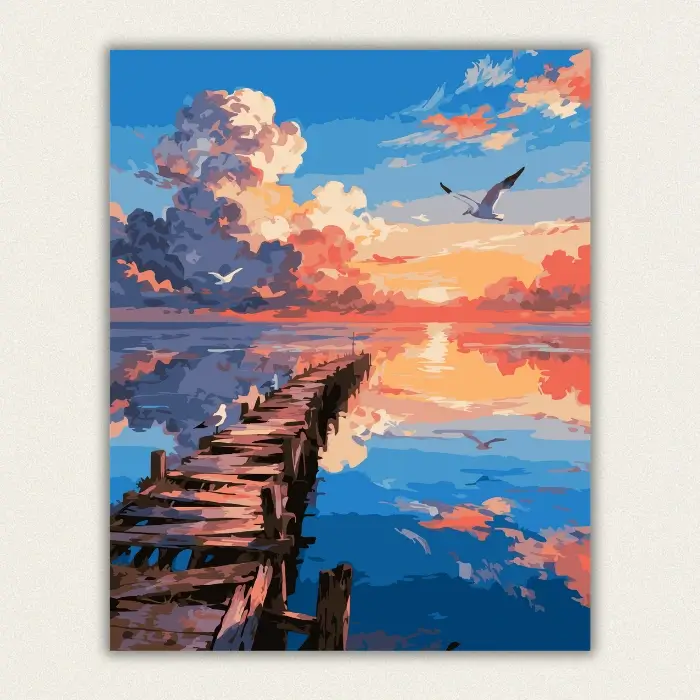 Finished paint by numbers canvas of a colorful sunset over a wooden pier