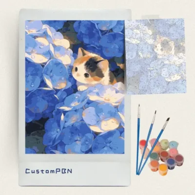 Calico kitten among blue hydrangea paint by numbers kit with brushes and paints