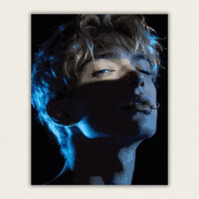 Dark portrait of a blonde young man lit by blue rim light wearing a lip ring paint by numbers finished canvas