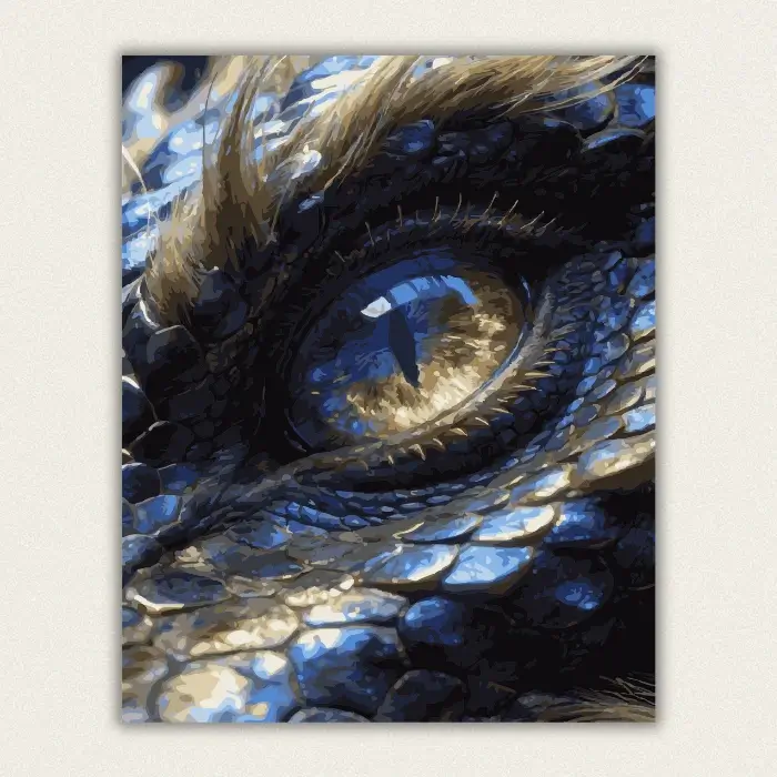 Close up of a huge dragon eye with a golden iris and blue scales paint by numbers finished canvas